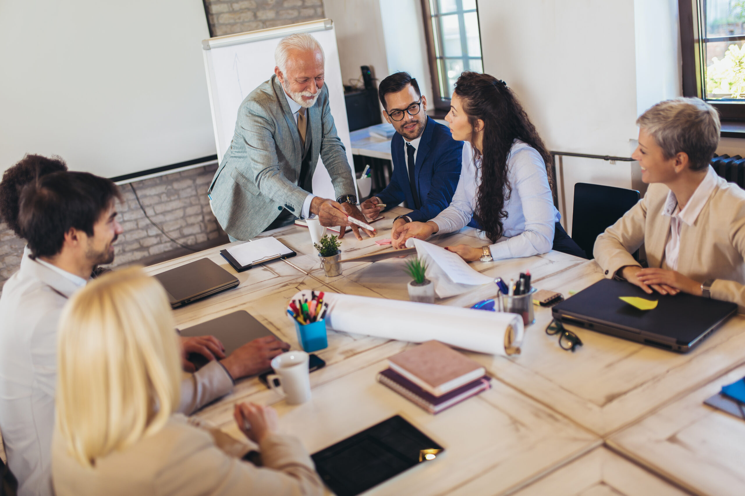 Diverse group of district leaders selecting the right curriculum and tools for their district.
