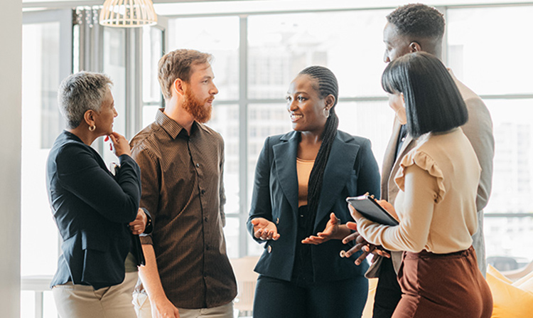 A group of five district leaders discussing California's New Math Instructional Materials List.